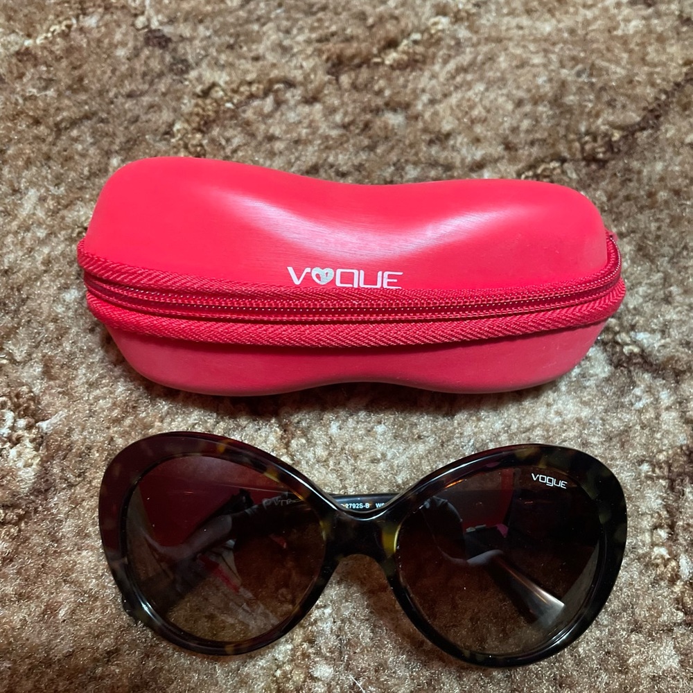 Vogue sunglasses with heart on the temple.